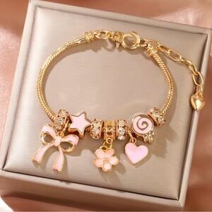 Gold Pink Charm Bracelet-Bow, Star, Flower, Heart Charms and Crystal Accents
